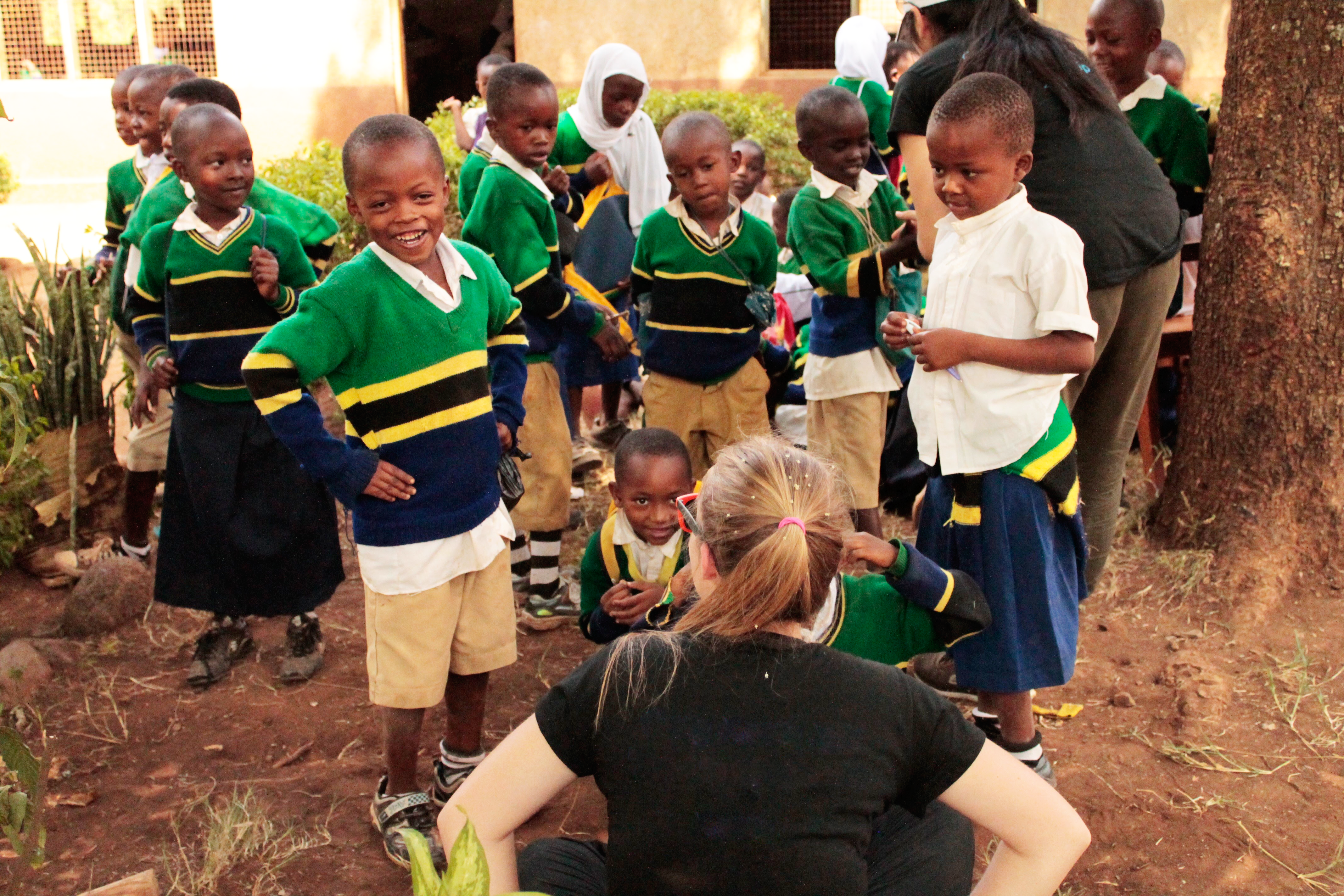 An Explorica student interacts with the locals in Tanzania.