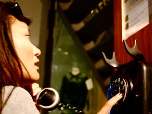 Student on a London educational tour in a phone booth